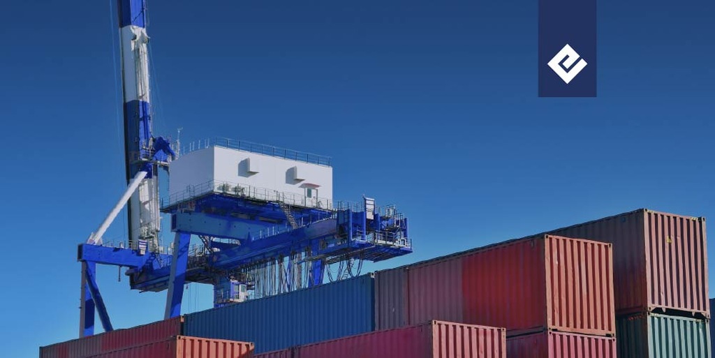 Supply chain operation at a port with stacked containers and an industrial crane, representing logistics and cargo transportation.